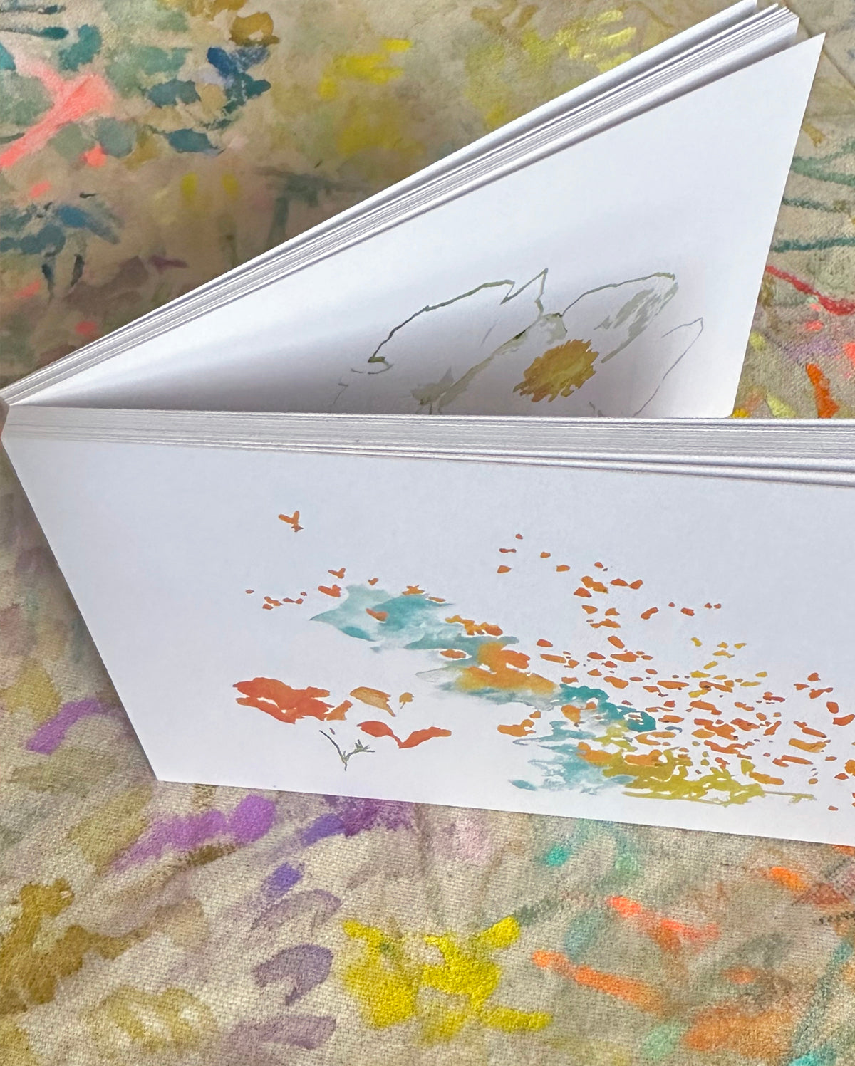 book of postcards from "Kaleidoscope (How'd Ya Get To Be Happiness?)"